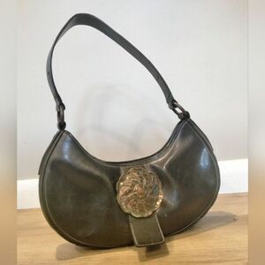 Women's black purse by fina Firenze with patina flower